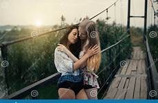 lesbian outdoors blonde together couple concept beautiful brunette girlfriends young hipster preview
