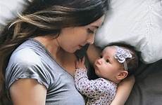 baby cuddling mommy mom mother girl bed newborn poses instagram photography shoot