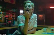 margot robbie trailer her terminal she kiss waitress transforms seductress pain instinct unleashes killer bed into haired enemy raven tortures