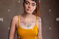 nipples pierced young woman nipple piercing tattoos alamy adult stock fife scotland