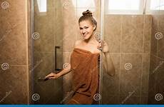 shower girl sexy young bathroom towel woman wrapped takes brown tile attractive stock background body