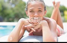 girl teenage pool bikini sunbathing beach stock swimming alamy braces relaxing next
