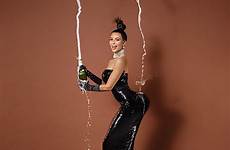 kardashian champagne balancing bum