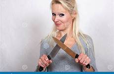 knife woman blond two stock