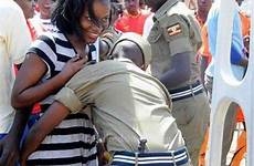 uganda women police female fondling ugandan security searching naked football fans comes when public joke around private checks ladies faso