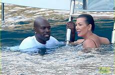 kardashian kourtney italy swimming yacht goes boat off kris jenner bikini swim shopping size gamble corey