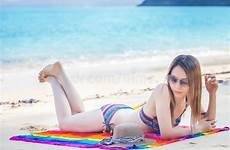 bikini asian beach girl relaxing tropical straw hat beautiful