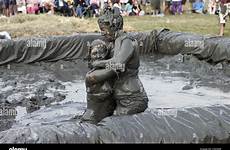 mud wrestling lowland championships quirky held annual games stock alamy festival july shopping cart downloads