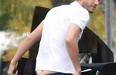 ashton kutcher his mila spread kunis hair open actor brown while backside bottoms slouchy stepping flashes wife down letting uncombed