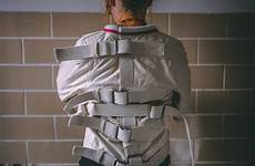 straitjacket asylum