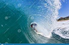 crashing surfer surfing wave closeup tube inside swimming preview