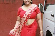 actress hot minu kurian aunty navel big movie huge saree red launch mallu stills below back mansoor khan ali college