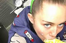 miley cyrus selfies suggestive raunchy provocative shoot old after shots her she continues run year frog hits dressing box updates