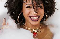 selfie swag foam laying afro flawless bath wearing lifestyle jewelry making teen modern young american girl stock