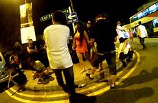 geylang singapore prostitution street economics asiaone open angsana tree under