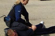 female policewoman swedish polizistin gefesselt cufs handschellen tights polizei domina