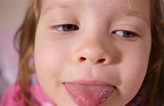 little tongue girl close closeup face kid cute funny jooinn eye grimace