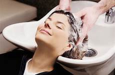 hair salon woman getting young shampooed