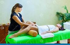 massage therapist giving