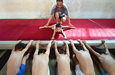 gymnastics school china young tiny camp children boy bent drilled teacher girl their chinafotopress summer boot getty via stretch putting