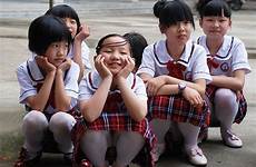china chinese school girls child little squatting group their policy shutterstock facts known liuyang yard credit worldatlas