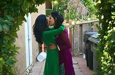 lesbians kissing pakistani kisses belly