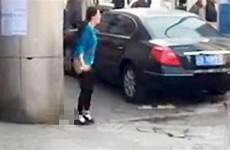 woman pooing outside street mirror train station video sickening shows weird front