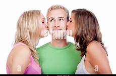 two kissing young man girls handsome standing isolated stock attractive restaurant boy between them women alamy
