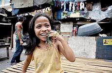 children slums manila poverty smiling street girl filth squalor young bath overcoming amid hope homes craze their who band paddling