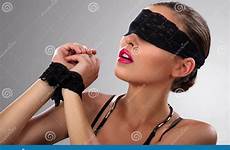 blindfolded girl attractive tied hands brunette close stock posing