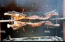 roasting spit fire open bison over alamy stock outside