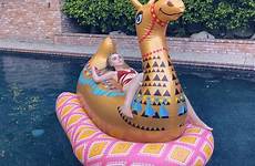 sabrina carpenter pool instagram rowan blanchard llama alyson hannigan saved celebs toys floating