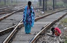 open india defecation indian railway kids toilet tracks defecating child defecate track children train people poor near getty toilets two