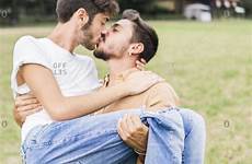 gay kissing couple young park offset stock questions any