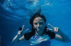 underwater preteen stocksy