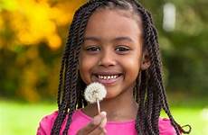 girl african young cute portrait outdoor stock people holding flower little