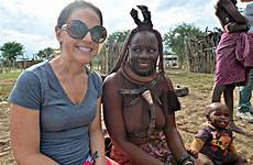 himba tribe namibia women africa visit himbas village culture beautiful authentic immersive tinted skin look red her epicureandculture