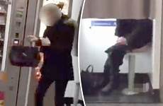 woman poo train station booth taking caught young toilet her takes paris videos load lyon gare