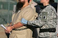 guantanamo guards gitmo inmates bay shackled prisoners transported camp citing beliefs npr violencia naval detainee detention siria thrill waterboarding foltermethode