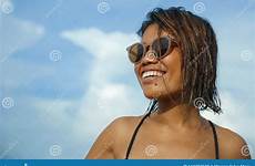 portrait shoulders sunglasses enjoying holidays lifestyle bikini asian head young beautiful girl tropical beach outdoors