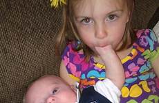 small sucking sister his big her sleeping he crayon box pacifiers climbing crib trick play latest into fingers