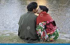 kiss japanese kissing kimono couple editorial kyoto japan kamo river adult young november