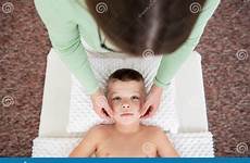 massage boy young kids concept female background therapist giving face top