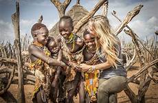 tribes ethiopian surma people suri ethiopia tribe children who they life body baby extreme teeth most touch huge their hair