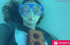 underwater breath girl holding
