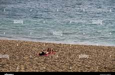 beach sunbathing mallorca majorca relaxing balearic island alamy