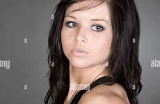 teen brunette stunning alamy against grey shot studio background