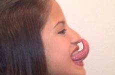 tongue her ear nose contortionist lick touching eye she venezuelan longest tip
