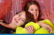 having teenage fun two girls bed