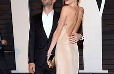 behati prinsloo oscars party adam levine slip wardrobe malfunction vanity fair nip dailymail off her laughs she old husband laugh